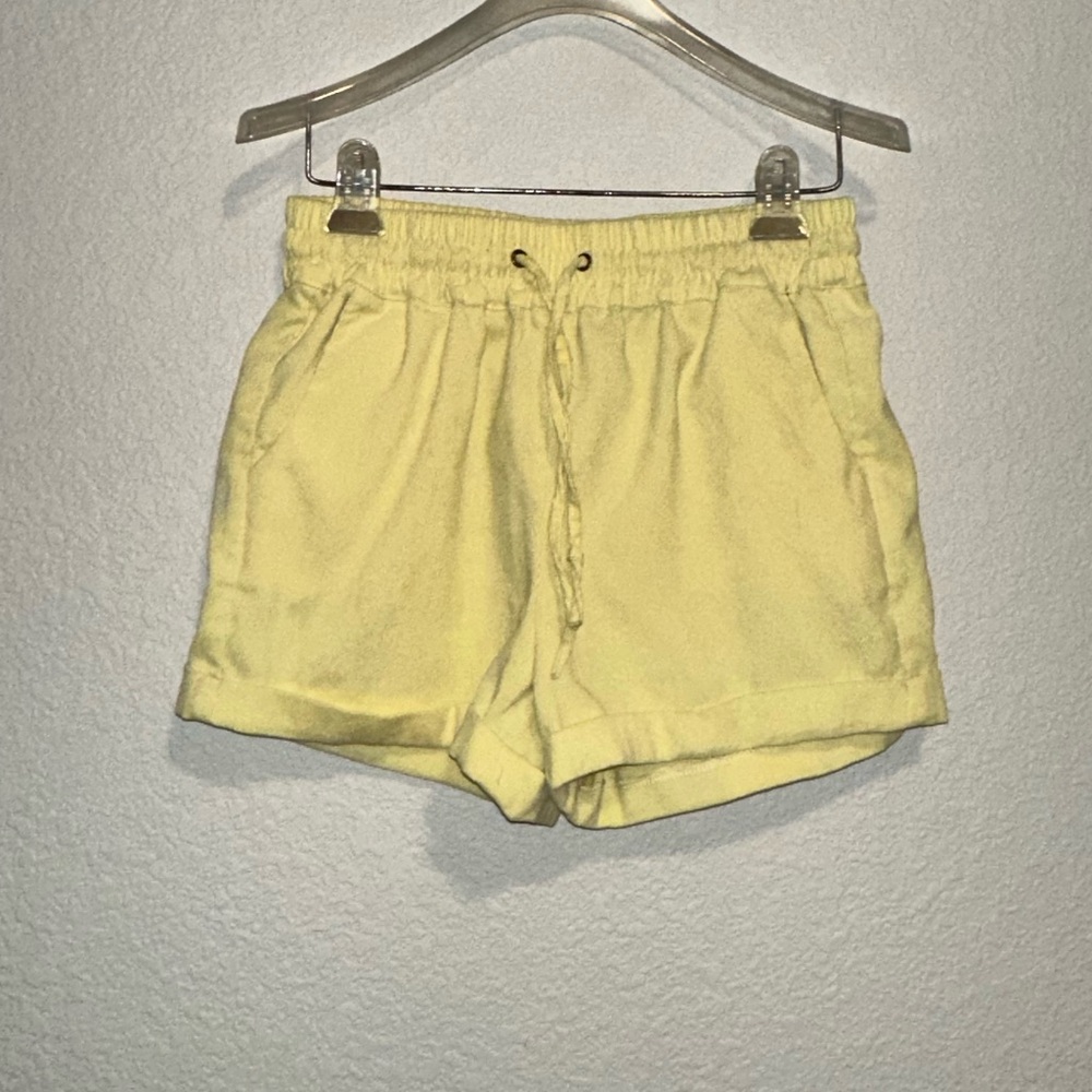 Yellow high waisted textured shorts, elastic waist band